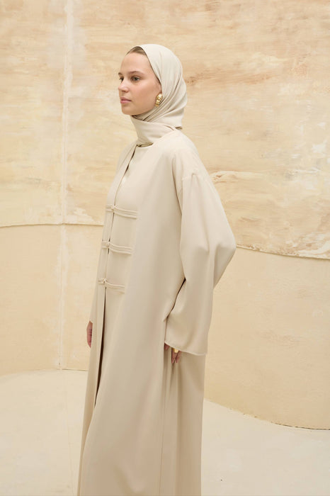 Abaya mit Perlendetails