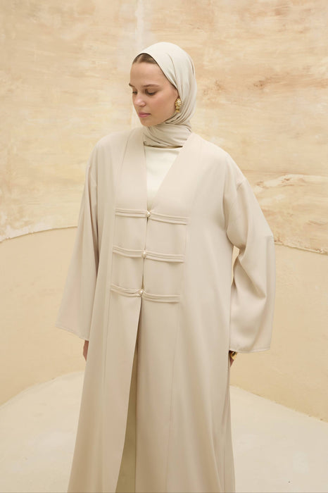 Abaya mit Perlendetails